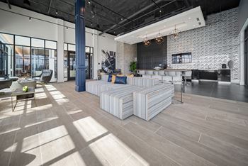 a large room with couches and chairs at Altis Grand Central, Tampa Florida